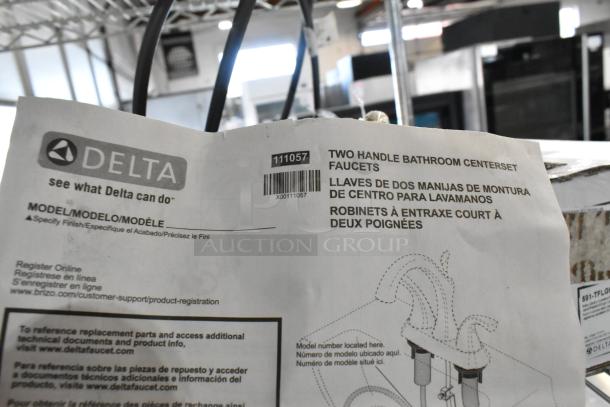 Delta Faucet manual showing model specifications for two-handle bathroom centerset faucets with multilingual instructions.