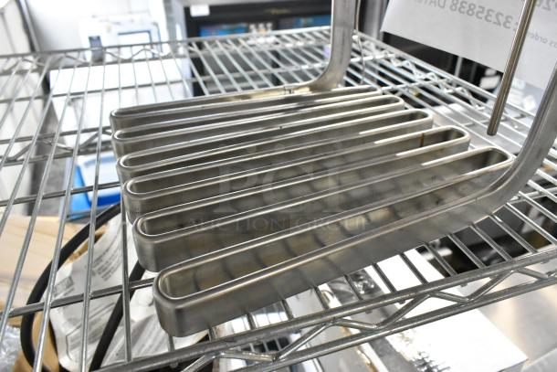 Brand new HP2EA001C Perfect Fry 83339 Heater Assembly; 7.2 KW; 240V; 1PH; scratch and dent condition; on metal rack.