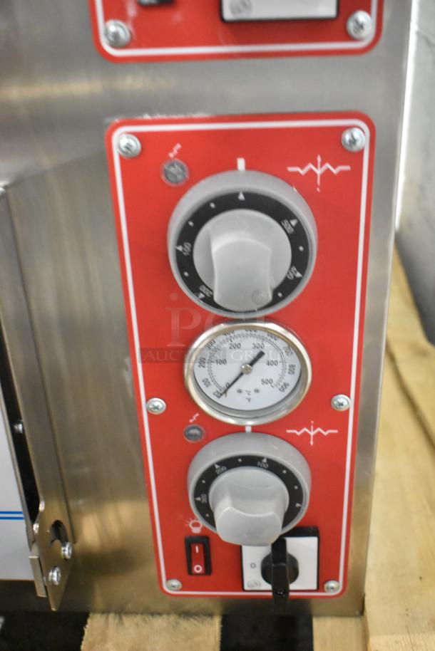 Trento stainless steel 2-deck pizza oven control panel, featuring temperature dials and settings. Brand new, scratch and dent condition.