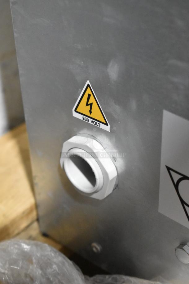 Trento stainless steel countertop pizza oven, 230 volts, with electrical connection detail and safety voltage sticker.