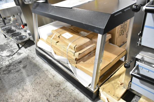 BRAND NEW SCRATCH AND DENT 2025 Vollrath FMA7036 HFM-36 36" Hot Food Merchandiser, 120V, shown on a warehouse floor.