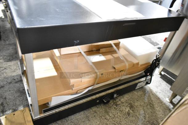 Brand new 2025 Vollrath FMA7036 Hot Food Merchandiser, 36", 120V, 1 Phase. Scratch and dent condition, boxed.