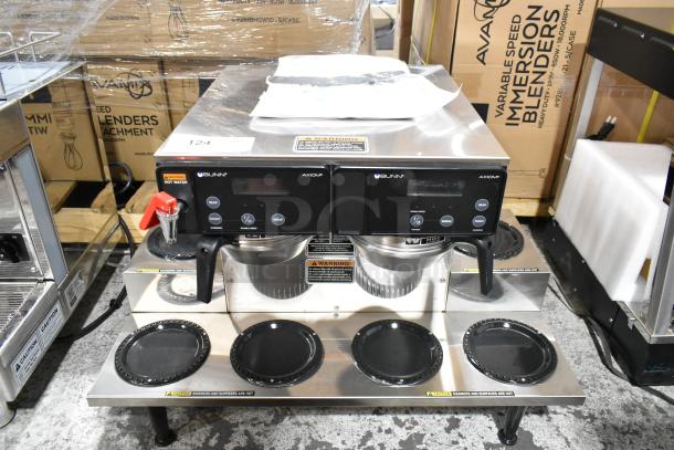 Brand new Bunn AXIOM 0/6 TWIN coffee brewer, 12-cup, stainless steel, with 6 warmers, hot water dispenser, and 2 brew baskets.