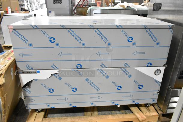 Alt text: Beverage Air SM58HC-W stainless steel commercial 58" cold wall milk cooler, brand new with scratch and dent, on casters.