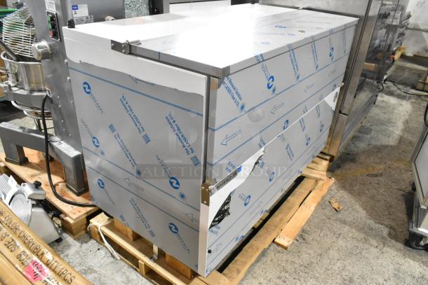 Brand new Beverage Air SM58HC-W milk cooler, stainless steel, scratch and dent condition, on pallets, with protective wrap.