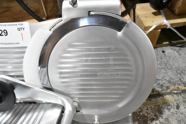 New Globe G10 10" Manual Gravity Feed Slicer with blade sharpener, 1/3 hp, minor cosmetic scratches, 115V, 1 phase.