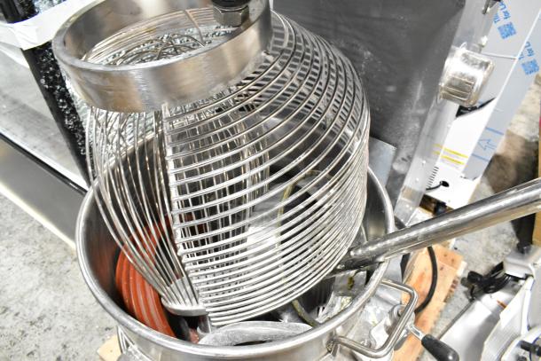 Brand new Avantco 177MX60H 60 Qt. planetary dough mixer with bowl guard, hook attachment, 240V, 3-phase. Scratch and dent.