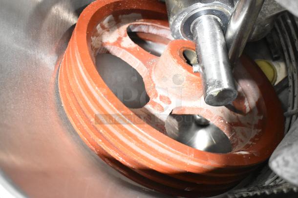 Avantco 177MX60H planetary dough mixer, close-up of metal mechanism, scratch and dent condition, 60 qt. capacity.