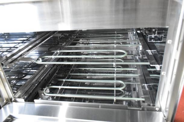 Avantco 177DPO18DS new stainless steel double deck pizza/bakery oven, electric, interior heating elements visible, 240V, 1 Phase.