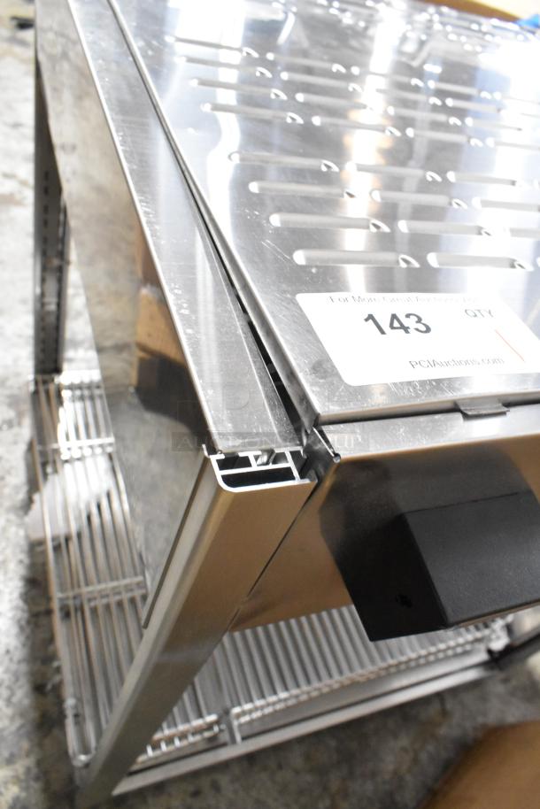 Brand new ServIt 423PDW18D1S stainless steel 18" countertop display warmer, 4 shelves, 115V, visible label "143".