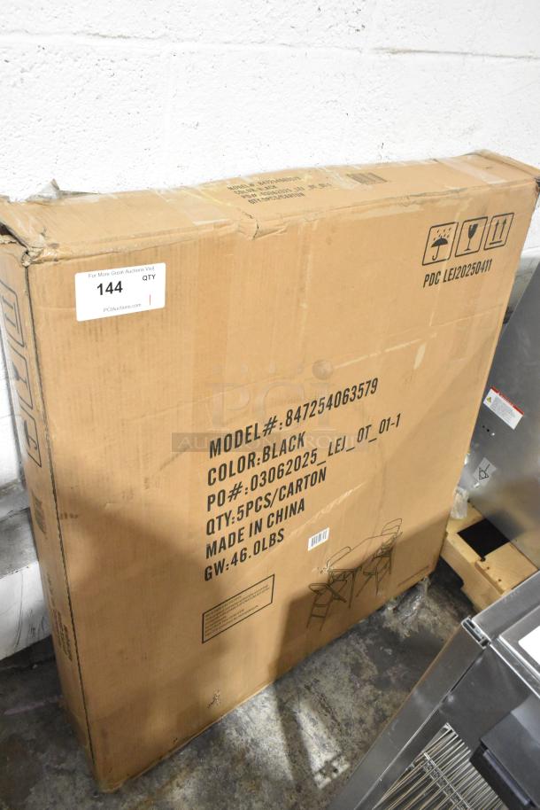 Cardboard box containing a scratch and dent black folding table, model 847254063579, made in China, 46 lbs.