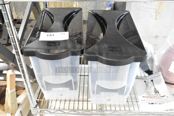 2 Choice 176BD3BK2 3-gallon black slim beverage dispensers, new with scratch and dent, on metal shelf.