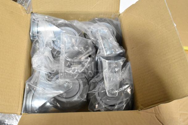 Lot of 4 brand new 1995074 casters in a box, each in individual plastic bags. Scratch and dent condition.