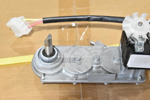 Brand new K935 unit, visible connector and motor parts, minor scratches, features barcode label.
