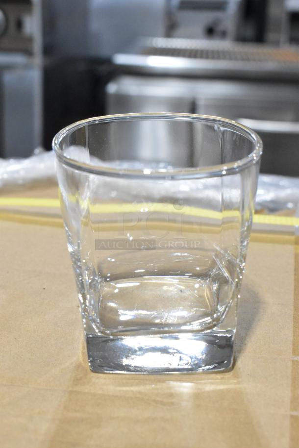 Acopa Cube 10 oz. Rocks/Old Fashioned Glass. Clear, sleek design, minor scratch/dent, brand new condition.