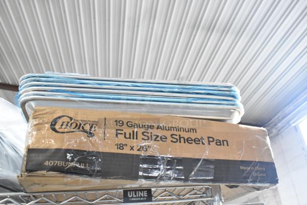 15 new Choice aluminum sheet pans, 18"x26", 19 gauge, with visible packaging. Scratch and dent. Auction includes 15 units.
