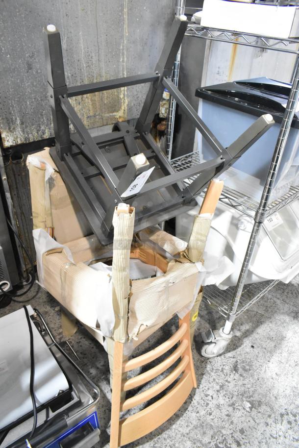 3 new scratched and dented dining height chairs, including 164CLADNATFR Wooden Ladder Back, in damaged packaging.