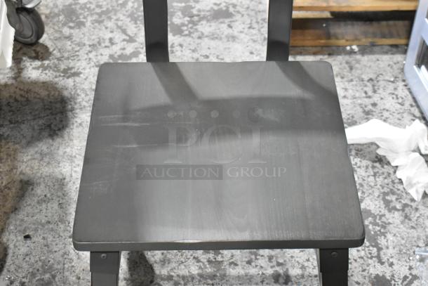 Wooden ladder back dining height chair, brand new with scratches, black finish, solid wood construction, visible seat detail.