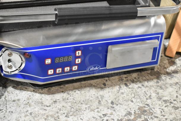BRAND NEW Globe GSG14D stainless steel sandwich grill, smooth plates, 14" x 14" surface, digital controls, 120V, 1 Phase.