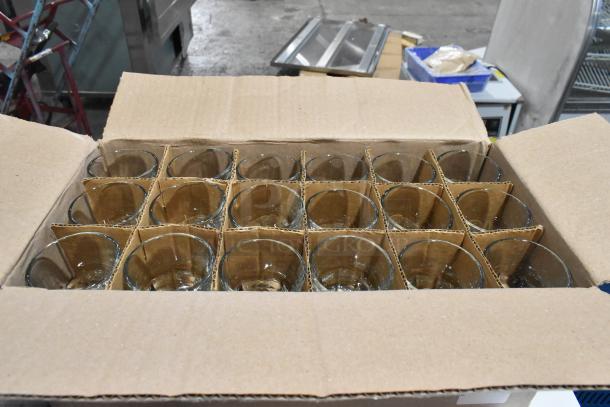 Box of new Anchor Hocking 90004 New Orleans 4.5 oz. espresso glasses. 18 glasses visible, separated by cardboard.