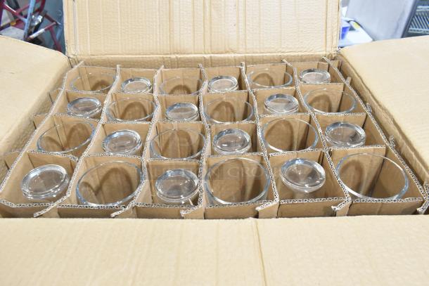 Box of Anchor Hocking 4.5 oz. espresso glasses, scratch and dent condition, packed in cardboard dividers.