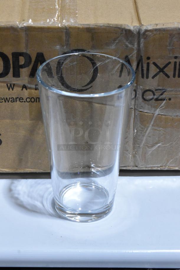 Acopa 16 oz. Mixing Glass displayed in front of original packaging. New condition, customizable; part of a 5-item auction lot.