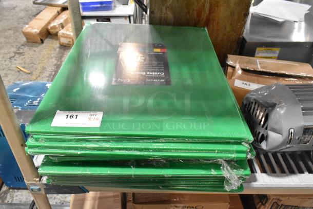 Set of 14 new Choice green polyethylene cutting boards, 24"x18"x1/2". Minor scratches and dents visible. Lot tag "161, QTY X14".