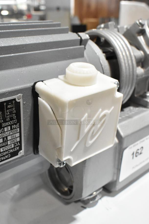 BRAND NEW SCRATCH AND DENT Capacitance Asynchronous Motor, 110V, 1 Phase, minor crack on protective casing, manufacturer's label visible.