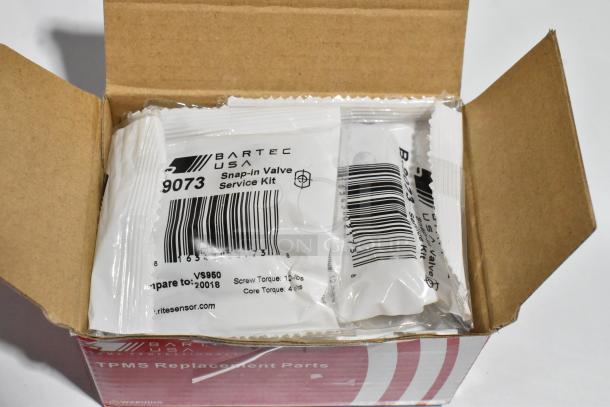 Box containing Bartec USA Snap-in Valve Service Kit packets, labeled with barcodes and torque specifications.