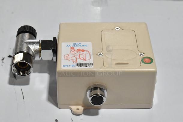 Electric faucet component from CYS-010 set, new condition, beige casing with metal connector. Label reads "Only AA Alkaline."