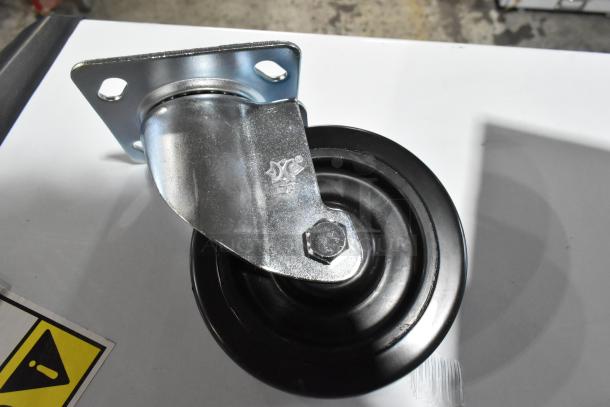 Brand new 351CASTER4 range plate caster, 4 3/4 inches, scratch and dent condition.