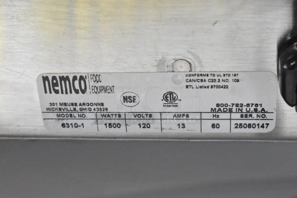 "Label on Nemco 6310-1 Hot Plate. Details: 1500 watts, 120V, 13 amps, Made in USA, NSF certified, ETL listed."