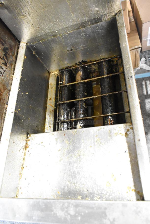 Dean SR42GNS stainless steel commercial deep fat fryer, natural gas, 105,000 BTU, on casters, used condition.