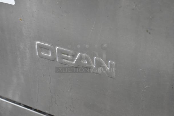 Dean SR42GNS stainless steel gas fryer, 105,000 BTU, commercial casters; embossed "DEAN" logo on surface.
