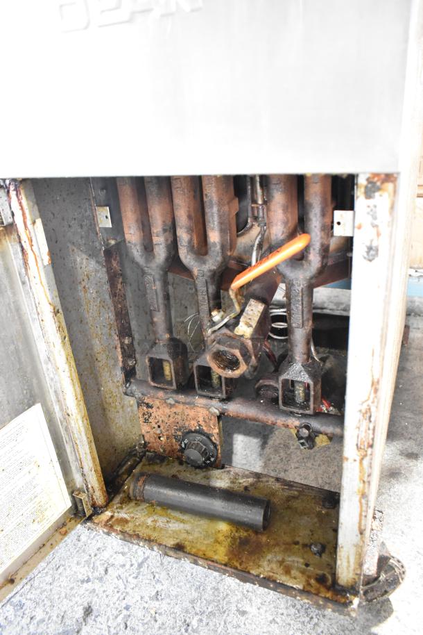 Dean SR42GNS stainless steel gas deep fryer, visible internal components, used condition, on commercial casters.