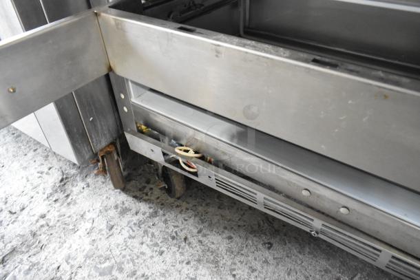 Beverage Air UCFD36AHC-2 stainless steel 2-drawer undercounter freezer on casters, 115V, showing underside and casters.