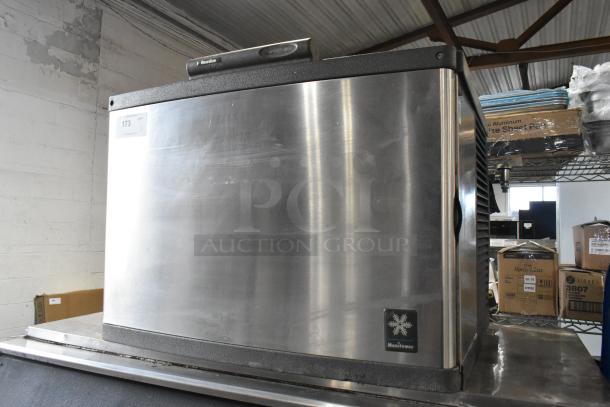 Manitowoc QD0452A stainless steel commercial ice machine head on bin, 115 volts, 1 phase, in good condition.