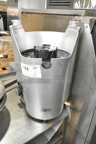 2021 Zumex Multifruit LED countertop citrus juicer base, 115 volts, 1 phase, silver, some wear, model labeling visible.