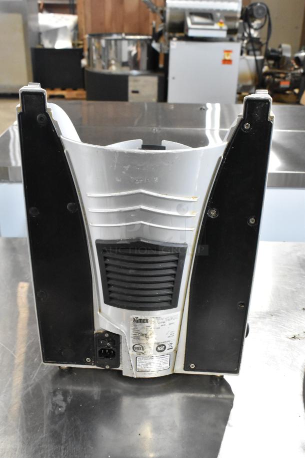 2021 Zumex Multifruit LED Juicer Base, 115V, 1 Phase, used condition, visible labels, silver and black casing.