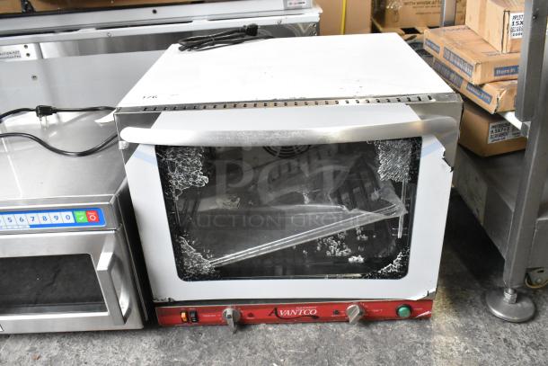 Brand new Avantco 177CO32M stainless steel countertop convection oven, 2.3 cu. ft., with glass damage, 208/240V, 1 phase.