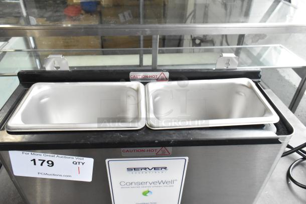 Brand new Server ConserveWell CW-T heated dipper well with timer. Scratch and dent, 120 volts, 1 phase, caution-hot label.