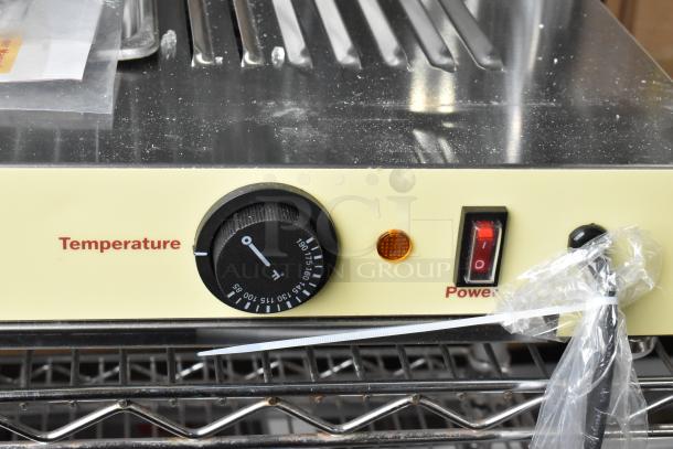 Carnival King hot food display controls, model 382HDSG2A, showing temperature dial and power switch.