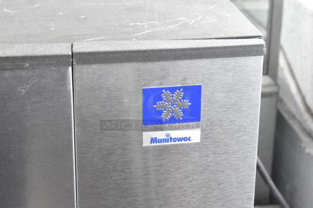 Stainless steel Manitowoc SD0452A commercial ice head, 115 volts, 1 phase. Manitowoc logo displayed, minor surface marks visible.