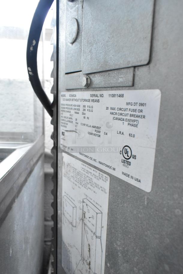 Manitowoc SD0452A stainless steel commercial ice head, 115V, 1 phase. Label indicates UL listing and serial no. 110811468.