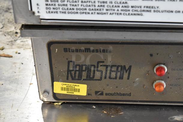 Southbend RS-4E SteamMaster stainless steel steam cabinet with visible controls and school label. 208V, single deck.