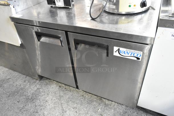 2022 Avantco 178AU48FHC stainless steel 2-door undercounter freezer on casters, in good condition, showing brand logo.
