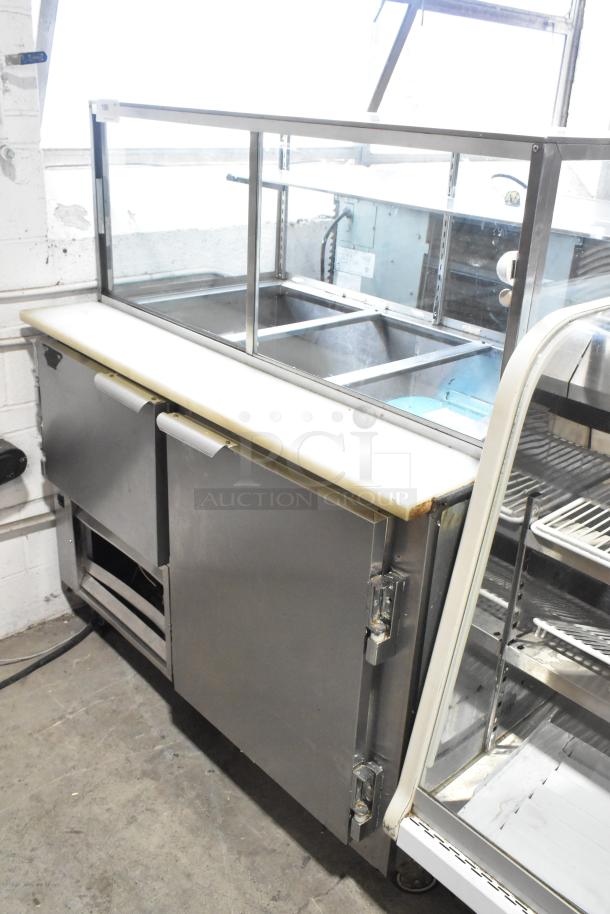 Leader LM48 S/C stainless steel prep table with sneeze guard, 115 volts, 1 phase, showing mild wear, ideal for commercial use.