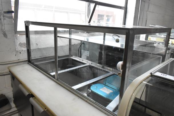 Leader LM48 S/C stainless steel commercial prep table with sneeze guard, in good condition, 115 volts, 1 phase.