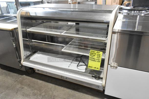 Universal Coolers metal commercial deli display case with shelving, glass front, and pricing sign. Clean and well-maintained.