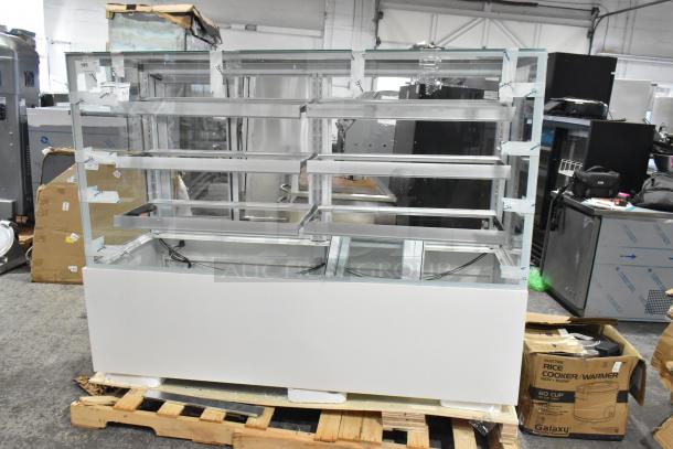 Brand new Avantco 193BCFD72W 70 7/8" white bakery display case with LED lighting. Scratch and dent condition.
